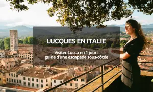 Vue panoramique de Lucca en Italie, avec une femme regardant la ville. Un guide pour visiter Lucca en 1 jour.