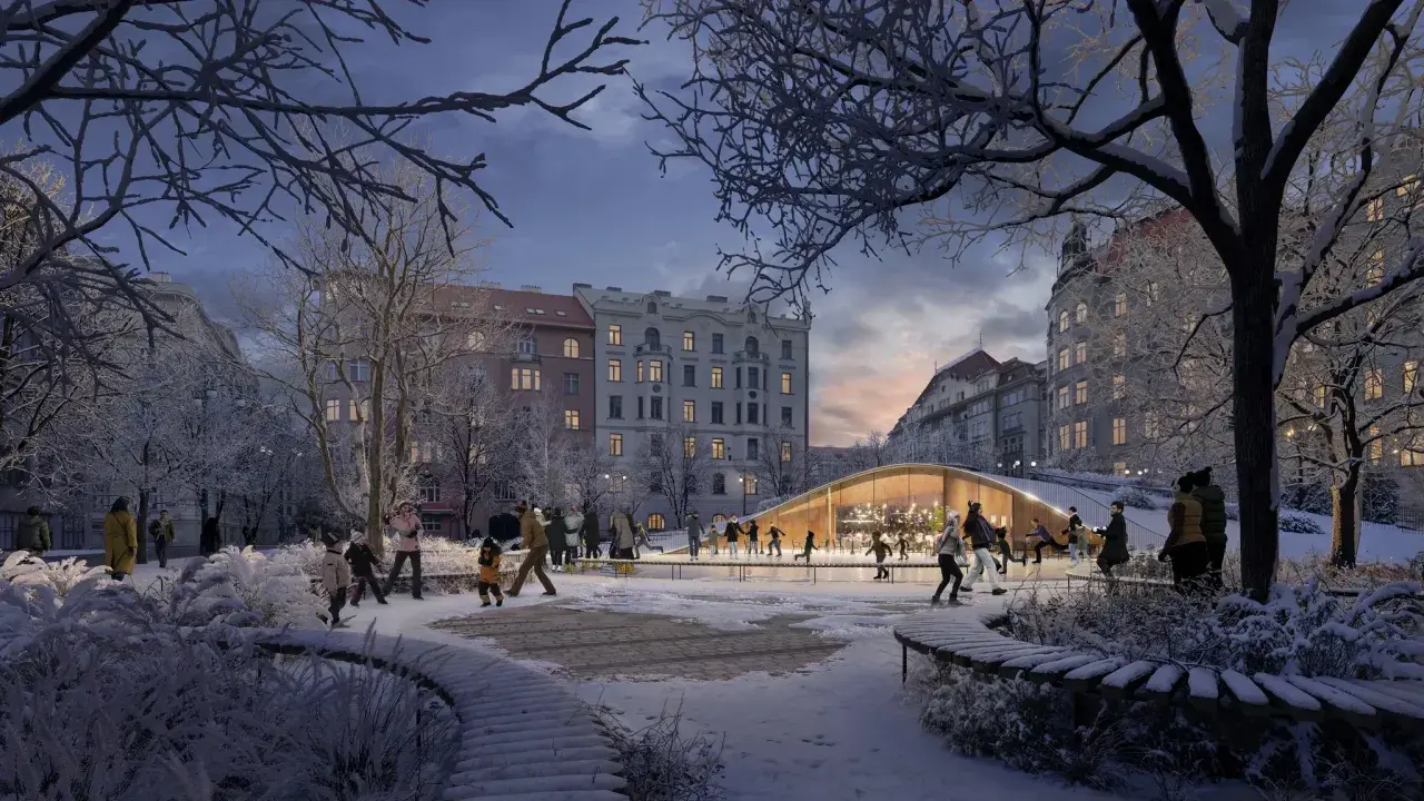 Une patinoire animée à Prague, sous un ciel crépusculaire, avec des familles profitant de la glace.